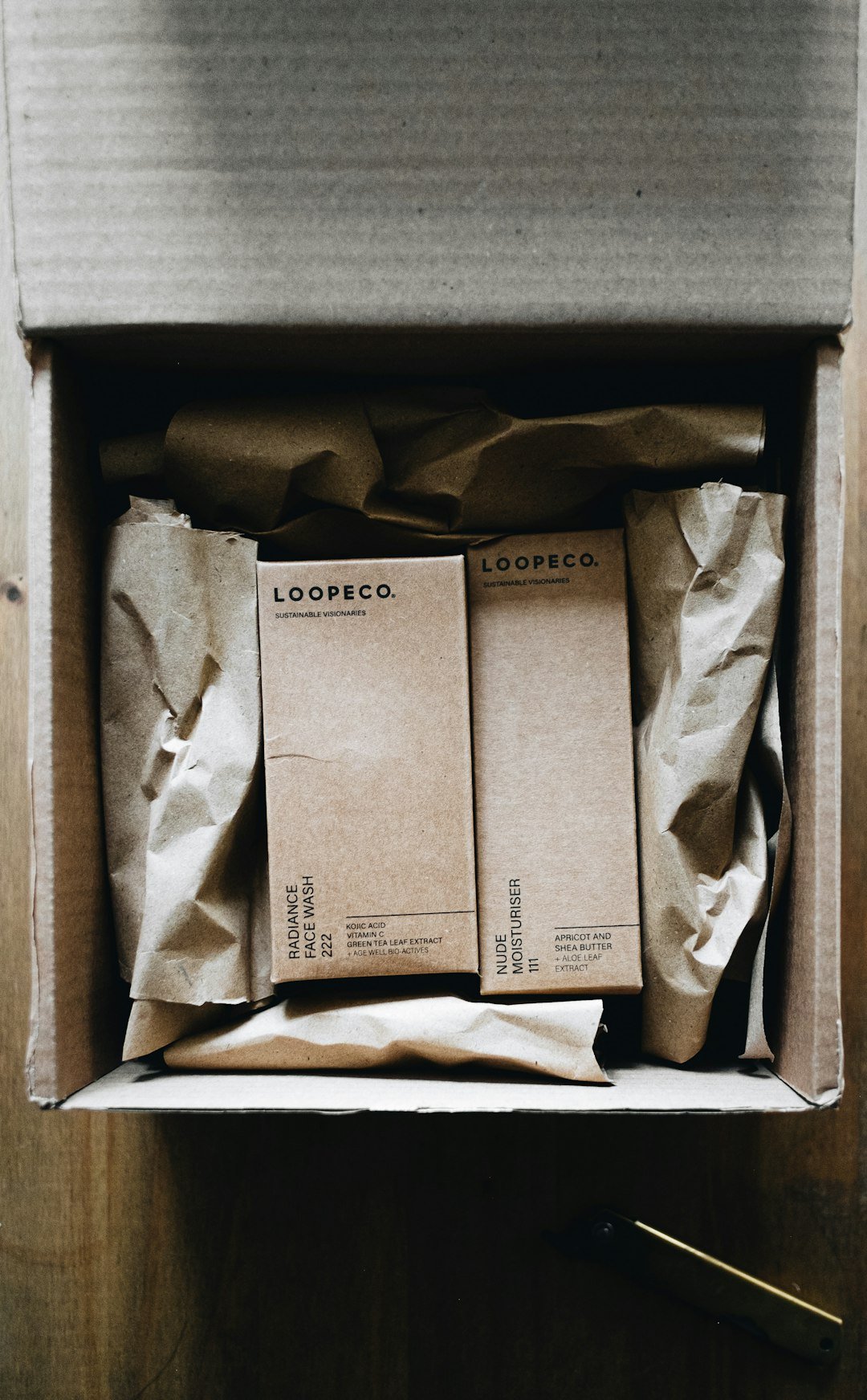 a-box-with-three-books-inside-of-it-0isjvmttldo